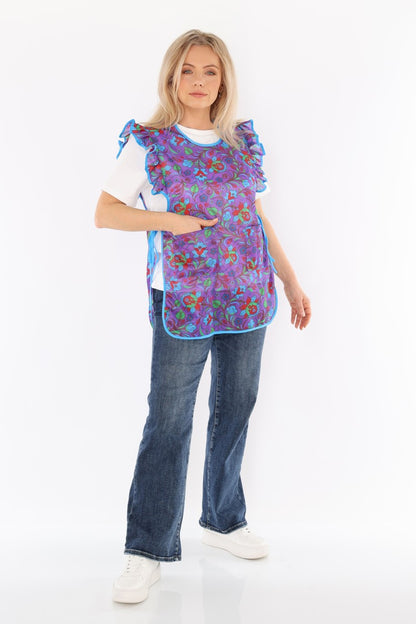 Floral pinafore apron with ruffle, two side pockets, tie-back fastening