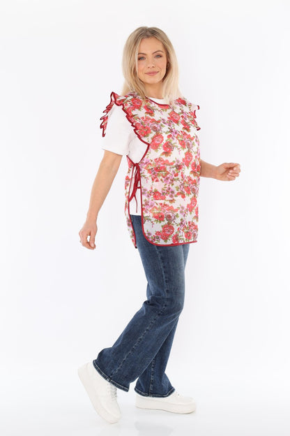 Floral pinafore apron with ruffle, two side pockets, tie-back fastening